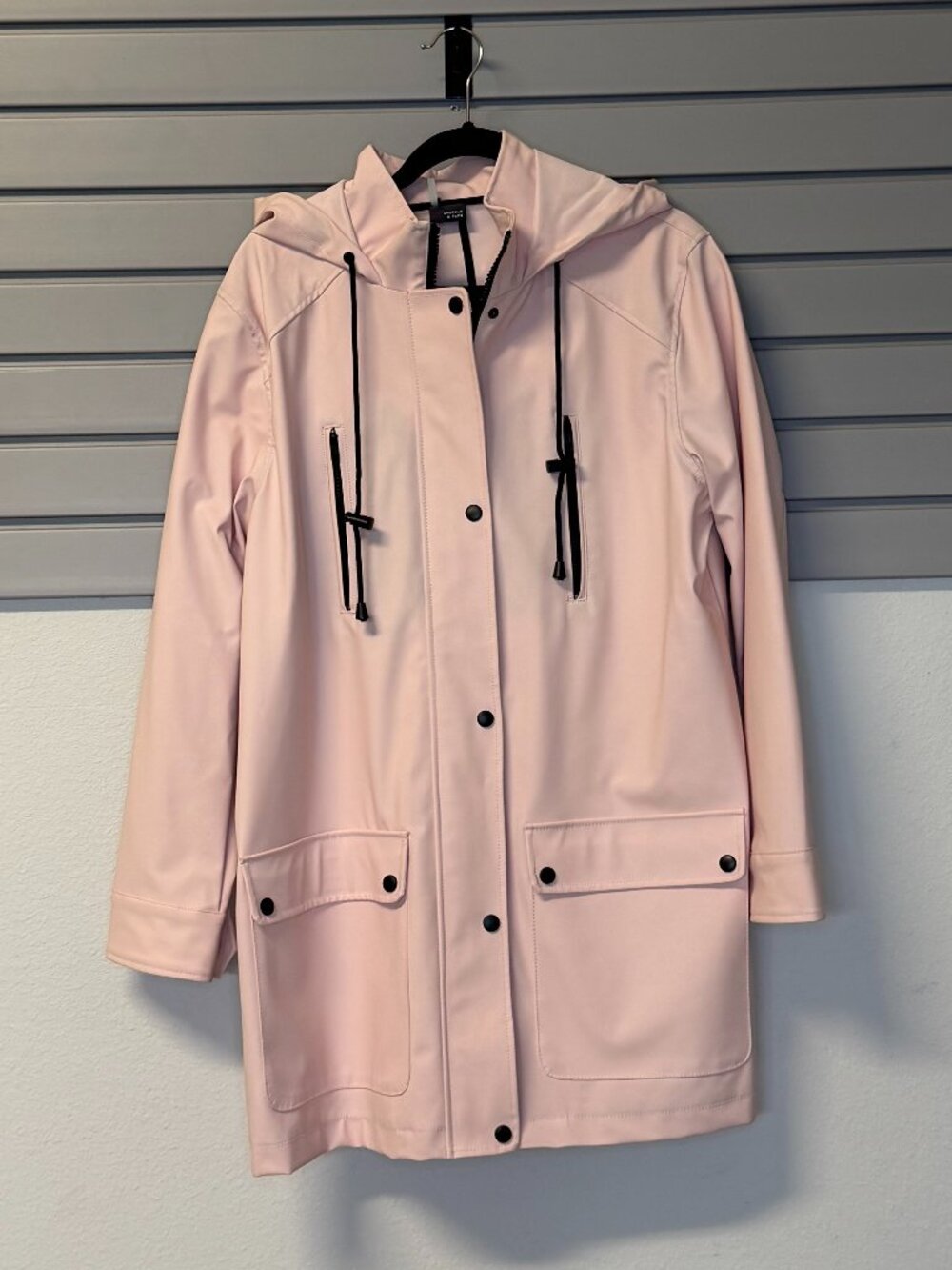 Light Pink Sparkle and Fade Urban Outfitters rain jacket.